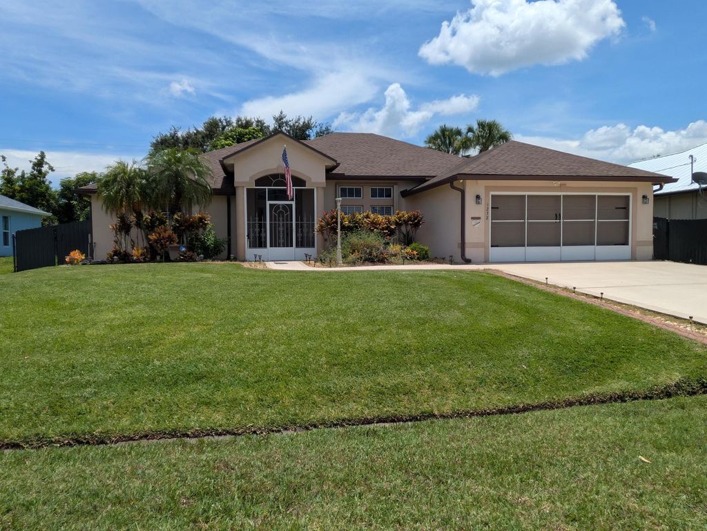Photo of 1232 SW Lawndale Avenue, Port Saint Lucie, FL 34953 (MLS # R11107102)