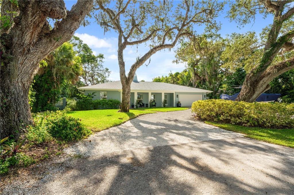 Your dream home awaits! Completely reinvented concrete block masterpiece nestled between the Indian River & Atlantic Ocean. Design led custom finishes & architectural details, every inch thoughtfully designed & engineered to perfection. Resort-style custom pool & spa w/Zellige water line tile & Dominican coral stone deck on large private lot. Features: restored white oak flooring, quartzite countertops, 48x48 Italian made ceramic floor tiles, white oak rift cut ceilings from The Netherlands, brand new plumbing & electric, new roof & a/c inc ductwork, fenced yard. NO HOA, bring your boat!