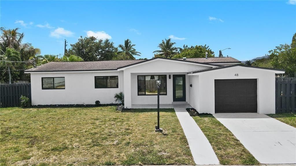 Photo of 48 SE 7th Street, Hollywood, FL 33004 (MLS # F10545503)