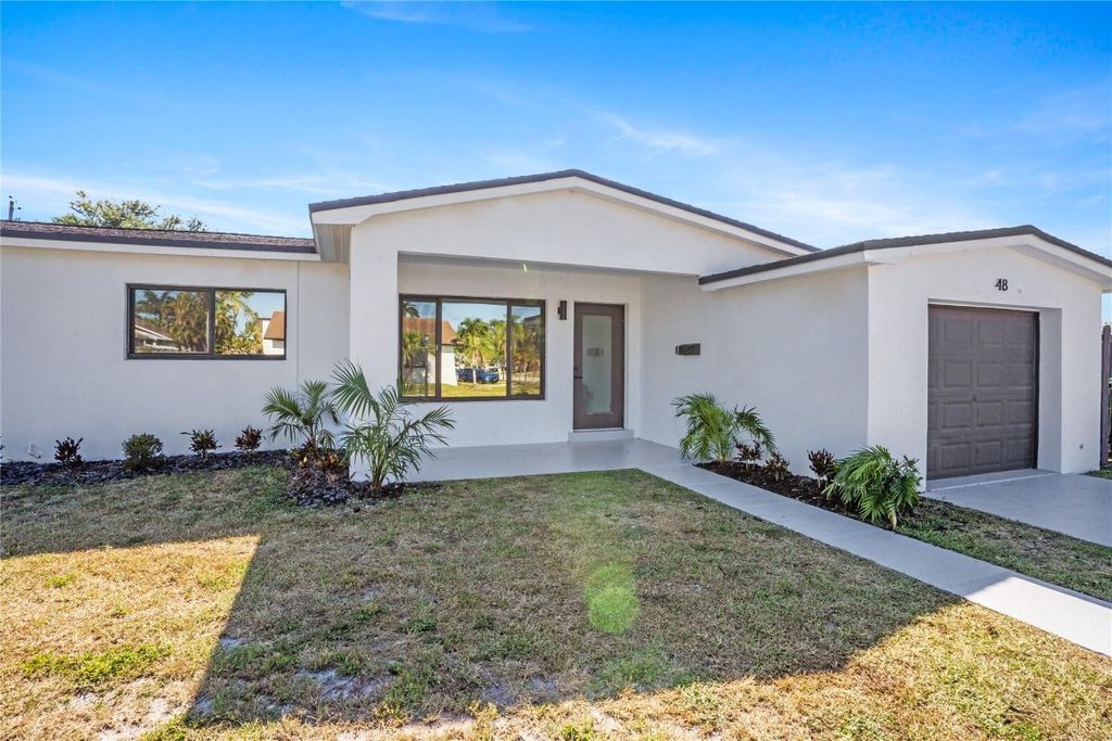 Photo of 48 SE 7th Street, Hollywood, FL 33004 (MLS # F10545503)