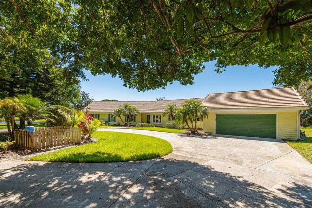 Photo of 10830 Kimberfyld Lane, Port Saint Lucie, FL 34986 (MLS # R10978413)