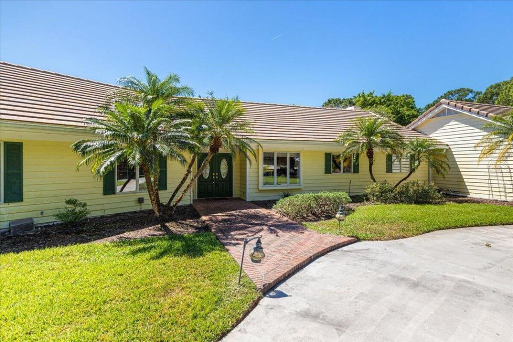 Photo of 10830 Kimberfyld Lane, Port Saint Lucie, FL 34986 (MLS # R10978413)