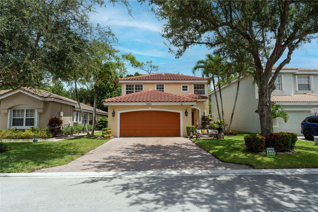 Photo of 4053 Crescent Creek Drive, Coconut Creek, FL 33073 (MLS # F10512164)