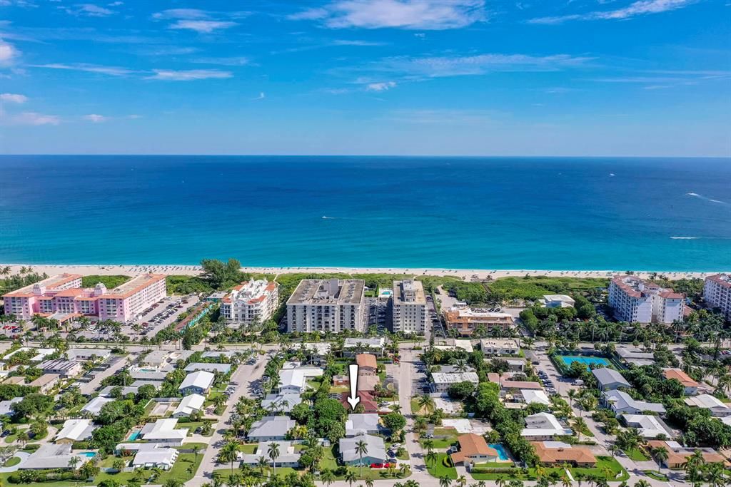 Photo of 125 Cascade Lane, Palm Beach Shores, FL 33404 (MLS # R10755880)