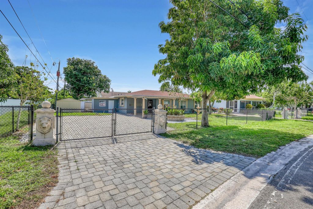 Photo of 4229 Bougainvilla Street, West Palm Beach, FL 33406 (MLS # R11011385)