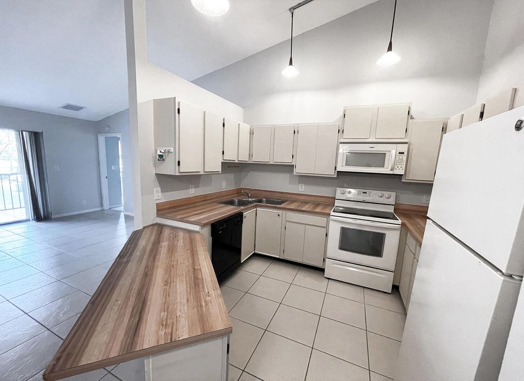 Photo of 6572 Chasewood Drive #E, Jupiter, FL 33458 (MLS # R11078638)