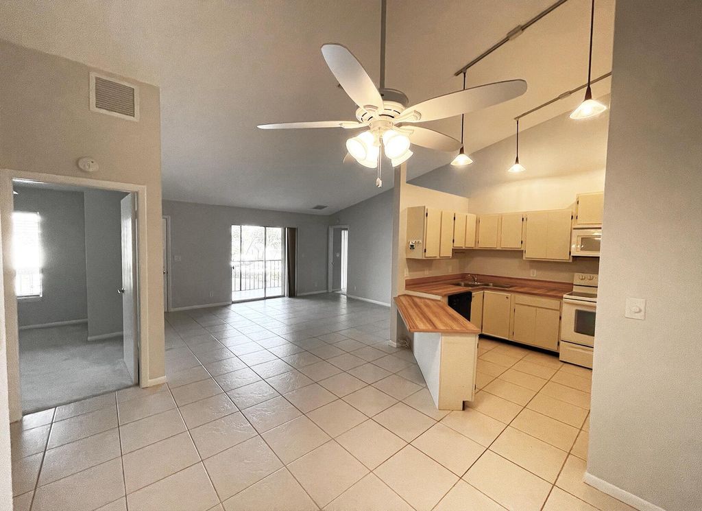 Photo of 6572 Chasewood Drive #E, Jupiter, FL 33458 (MLS # R11078638)