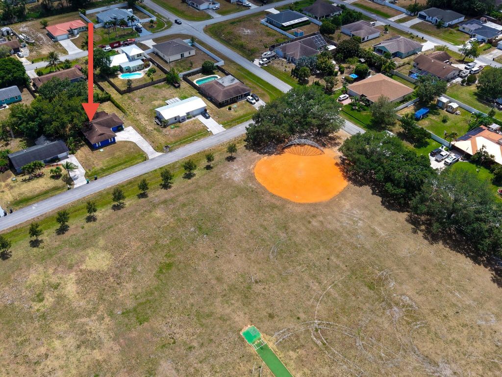 Photo of 572 NW La Brea Avenue, Port Saint Lucie, FL 34983 (MLS # R11086720)