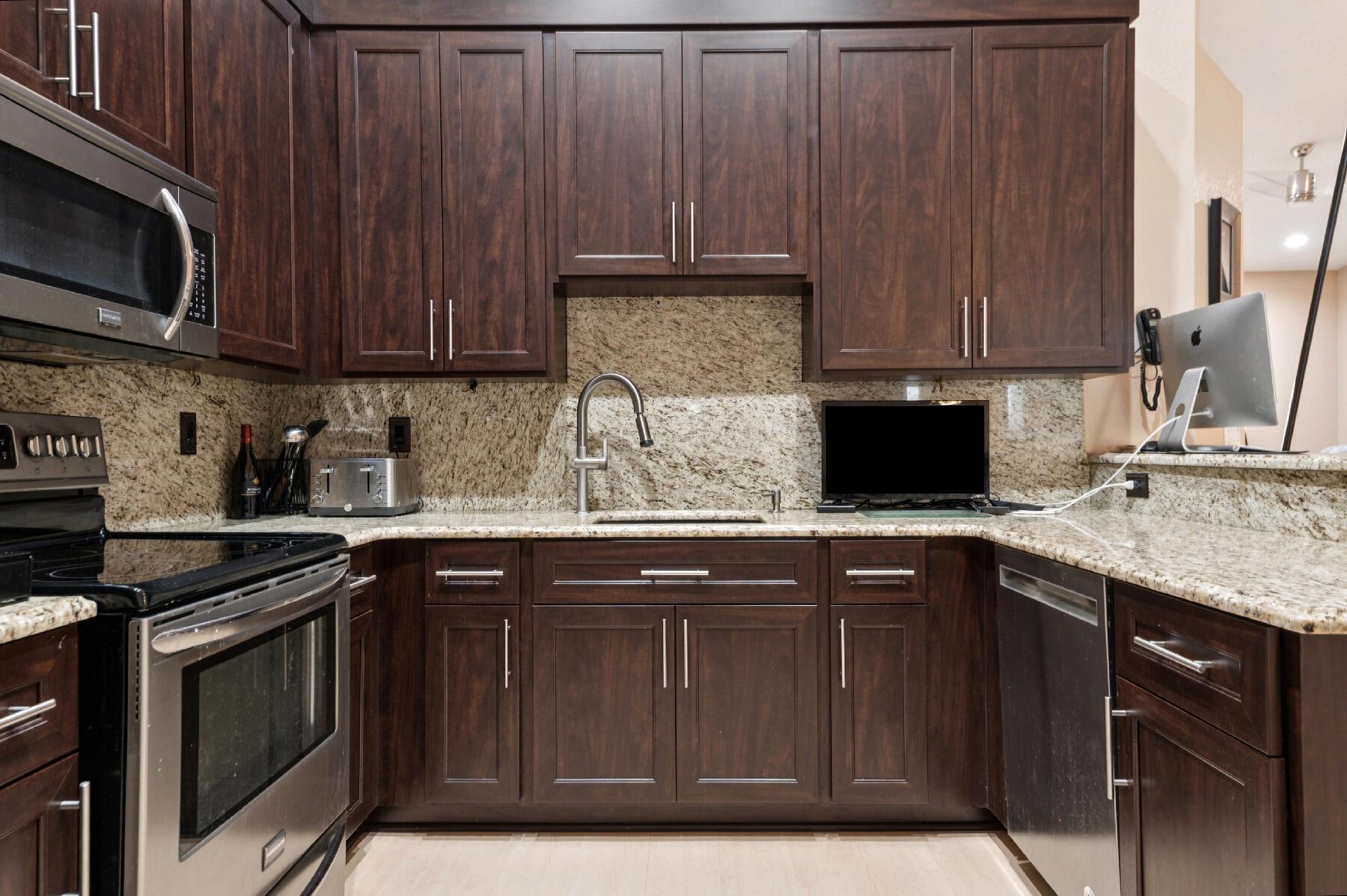 THIS REMODELED VILLA HAS LAMINATE FLOORING THROUGHOUT LIVING AREAS AND TILE FLOORING IN BOTH BATHROOMS. FURNITURE AND FURNISHINGS ARE ALL NEGOTIABLE. THE KITCHEN HAS MAHOGANY CABINETS, GRANITE COUNTERTOPS AND STAINLESS STEEL APPLIANCES. HURRICANE GLASS FRONT DOOR LETS IN EXTRA LIGHT. ACCORDION SHUTTERS THROUGHOUT. CLOSE PROXIMITY TO THE CLUBHOUSE, WHERE YOU CAN ENJOY MANY SOCIAL ACTIVITIES LIKE; DANCING, DINNERS, SHOWS, ART CLASSES, EXERCISE CLASSES, BBQ'S AND MUCH MORE. THE RECREATIONAL AREA HAS 6 TENNIS COURTS, 3 PICKLEBALL COURTS, 2 BOCCE COURTS PLUS A CHIPPING AND PUTTING GREEN. ASSOCIATION REQUIRES 6 MONTHS MAINTENANCE PAID AT CLOSING FOR CAPITAL INVESTMENT. CREDIT SCORE NEEDS TO BE AT LEAST 680