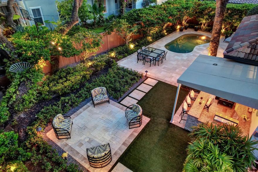 Timeless Modern Mediterranean inspired residence with one of Rio Vista's most prestigious & desirable addresses! Extremely well built on top of an elevated ridge providing a rare 9ft+/- flood elevation allowing insurance savings & less risk of flooding/standing water. Perfectly designed for SoFlo luxury living with impact glass & generator, open concept living & 2 potential home offices, incredible Chef's kitchen, ample storage, large center island & top-quality appliances including wine storage. The flexible floorplan features a superior Primary Suite with spa bath & 2 walk-in closets. Professional & lush landscaping on this large corner lot surrounds the residence creating a sense of privacy  Side access garaging permits additional car parking. Minutes from marina & Lauderdale Yacht Club