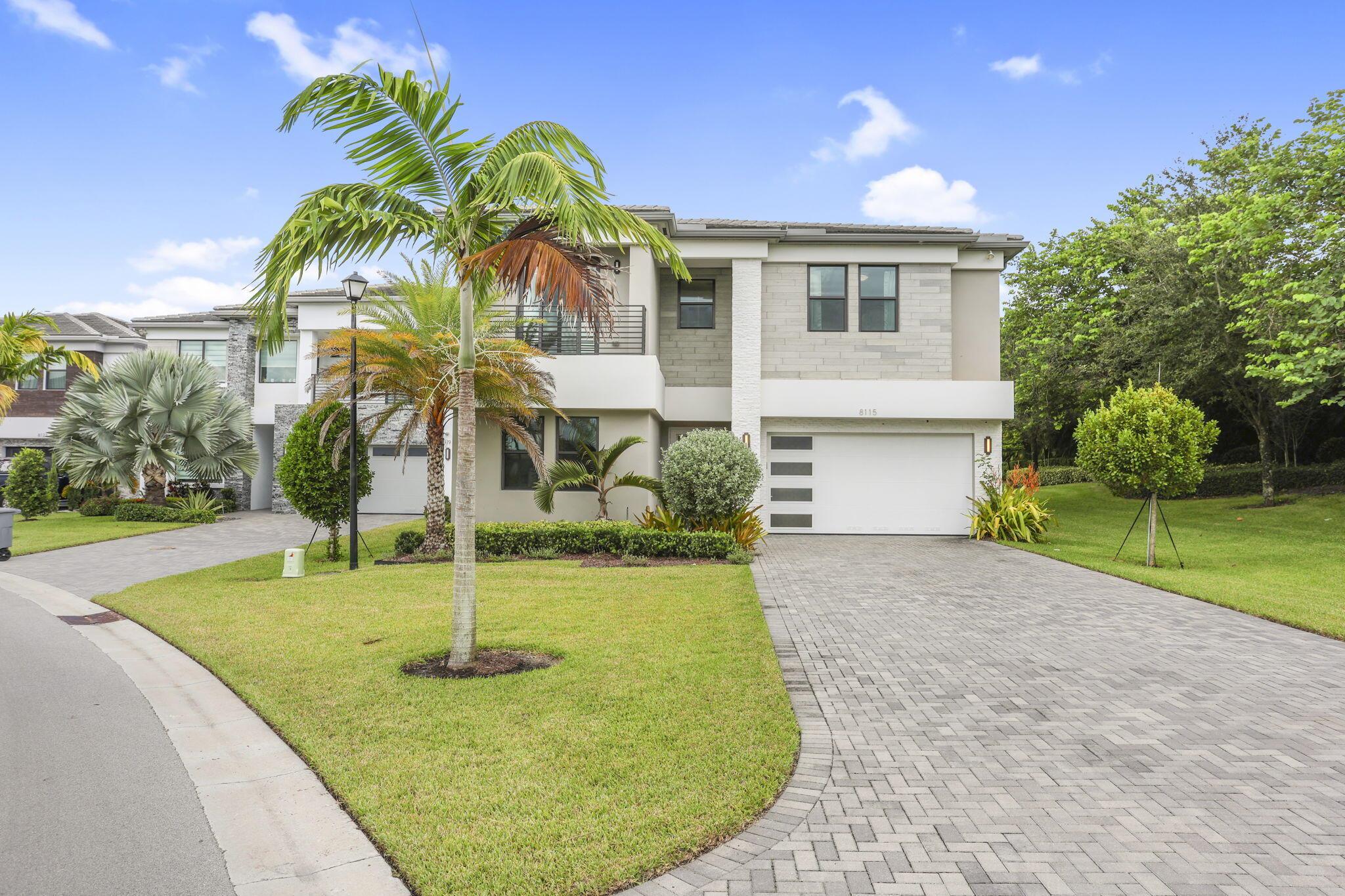 Exquisitely Designed Polynesia Model on Prime Private Lot. Step into this professionally interior-designed Polynesia model, a 5-bedroom, 7-bathroom showpiece nestled on one of the most private, sought-after lots in The Lotus community. With a rare extended driveway and expansive easement, this home offers unmatched privacy just a short walk to the state-of-the-art clubhouse featuring a restaurant, resort-style pool & spa, full fitness center, yoga garden, indoor basketball court, kids arcade, tennis & pickleball courts, and poolside bar. Inside, every detail has been thoughtfully curateda"custom light fixtures, glass staircase, and large-format tile flooring elevate the aesthetic. The chef's kitchen boasts a massive quartz island and upgraded cabinetry, perfect for entertaining or