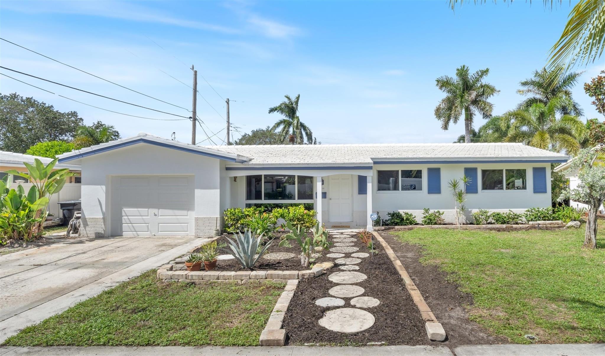 Located in the coveted Imperial Point neighborhood, this classic 3-bedroom, 2-bath home offers timeless Florida living with modern upgrades. Original owner since 1962, the home has been lovingly cared for & thoughtfully updated. The home features impact windows, a concrete tile roof, newer A/C & an electrical panel. Other features include: fresh interior & exterior paint, original terrazzo floors. Additional spaces include a breakfast nook & an enclosed Florida room. Great outdoor space with ample room for a pool. One-car garage with a washer and dryer. Easy access to major highways for commutes to downtown Fort Lauderdale, the airport, and the beach. A perfect fit for buyers seeking a classic home with a solid foundation that offers room to make it their own. Call to see it today.