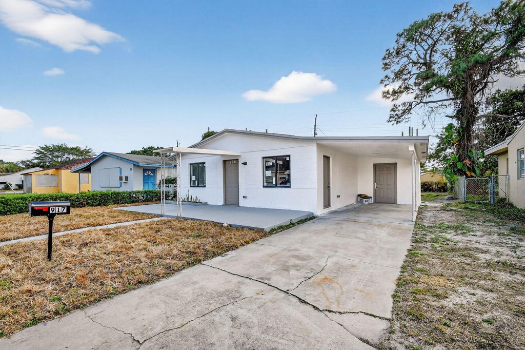 Photo of 917 W 2nd Street, Riviera Beach, FL 33404 (MLS # R11165258)