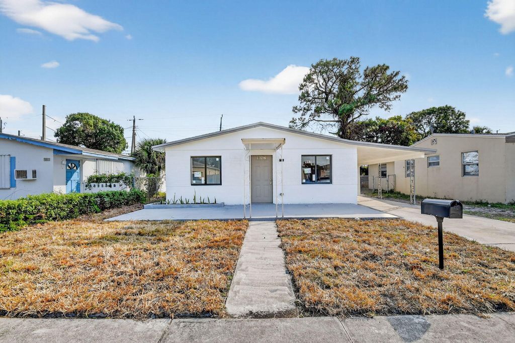 Photo of 917 W 2nd Street, Riviera Beach, FL 33404 (MLS # R11165258)