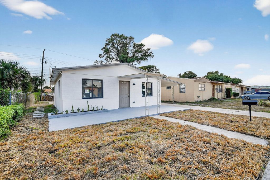 Photo of 917 W 2nd Street, Riviera Beach, FL 33404 (MLS # R11165258)