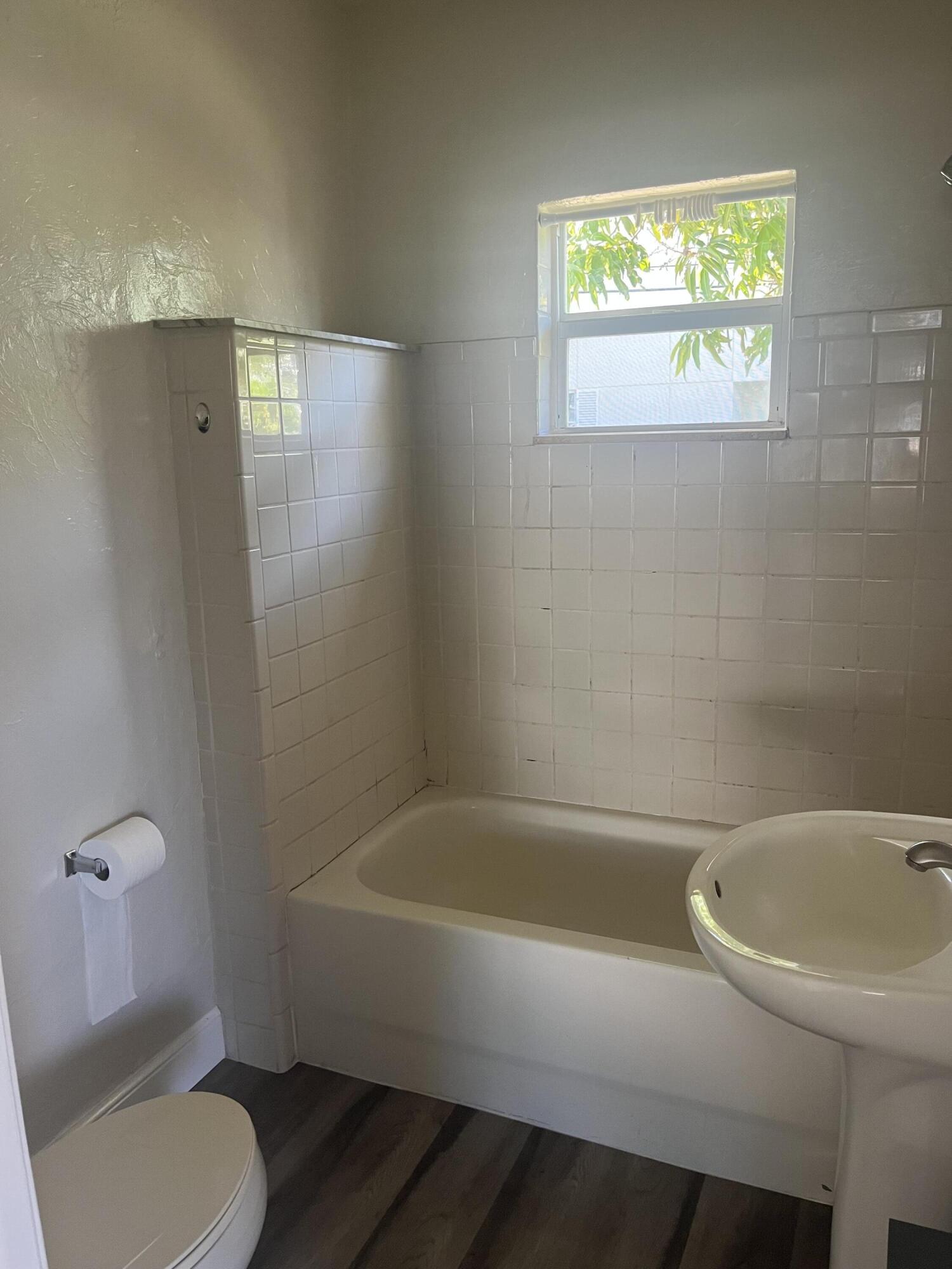 S/D OF 21-44-43, LT 1 BLK 34 OF W 1/2 IN - Residential Income