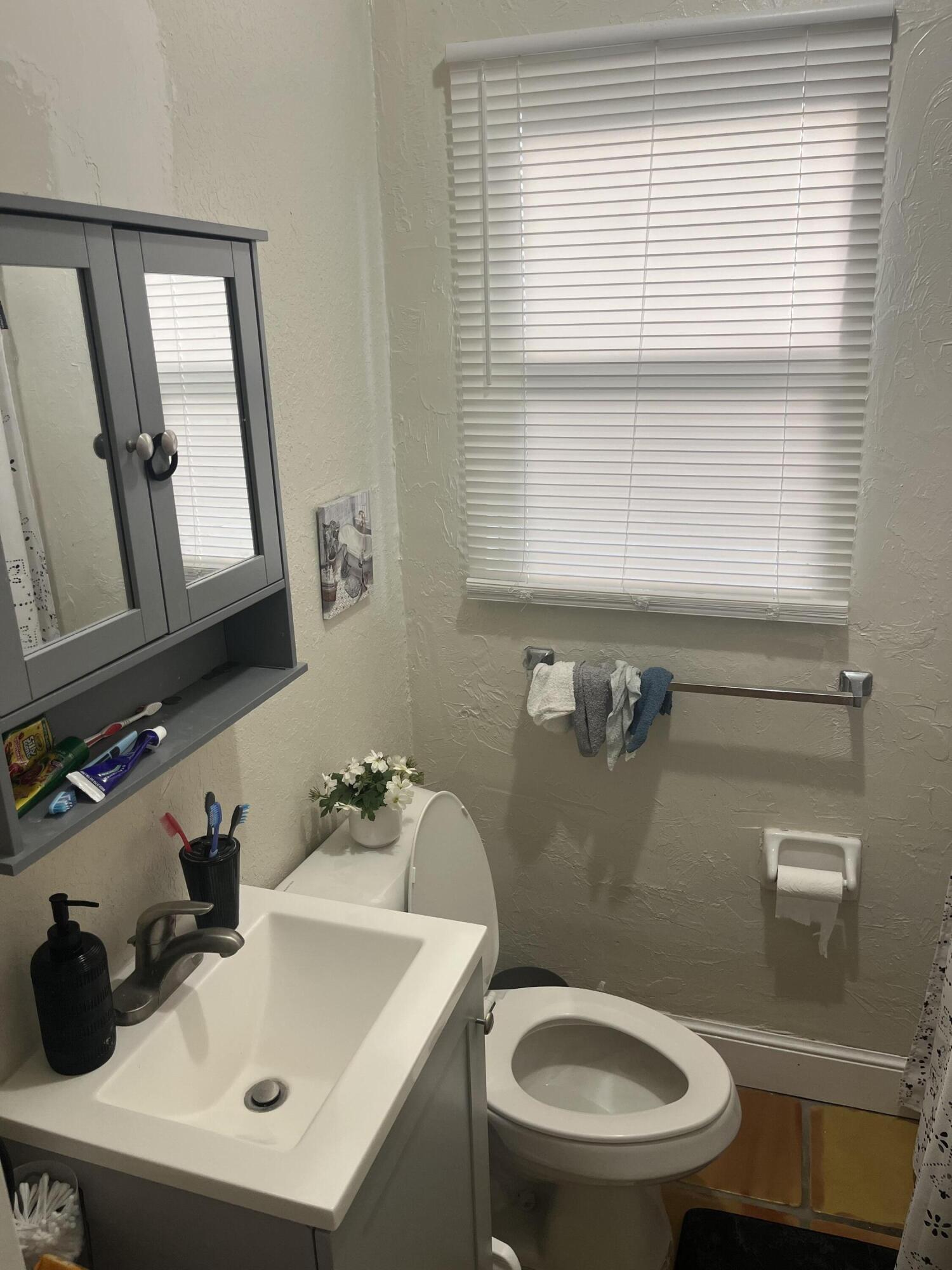 S/D OF 21-44-43, LT 1 BLK 34 OF W 1/2 IN - Residential Income