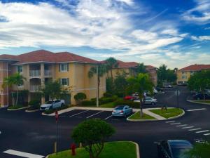Villas at Emerald Dunes is a unique resort style community, located on lush tropical grounds, surrounded by the world renowned, Emerald Dunes Golf Course. This beautiful 3 bedroom 2 bathroom unit will NOT last. One-of-a-kind community not only offers stun ning views, exceptional quality and so much more.Spacious 3/2 with a balcony. Covered Garage parking. Tile floors throughout the living areas. Kitchen has granite counters & stainless steel appliances.Brand new carpet, freshly painted & Brand New kitchen cabinets and appliances. Hurricane impact windows.