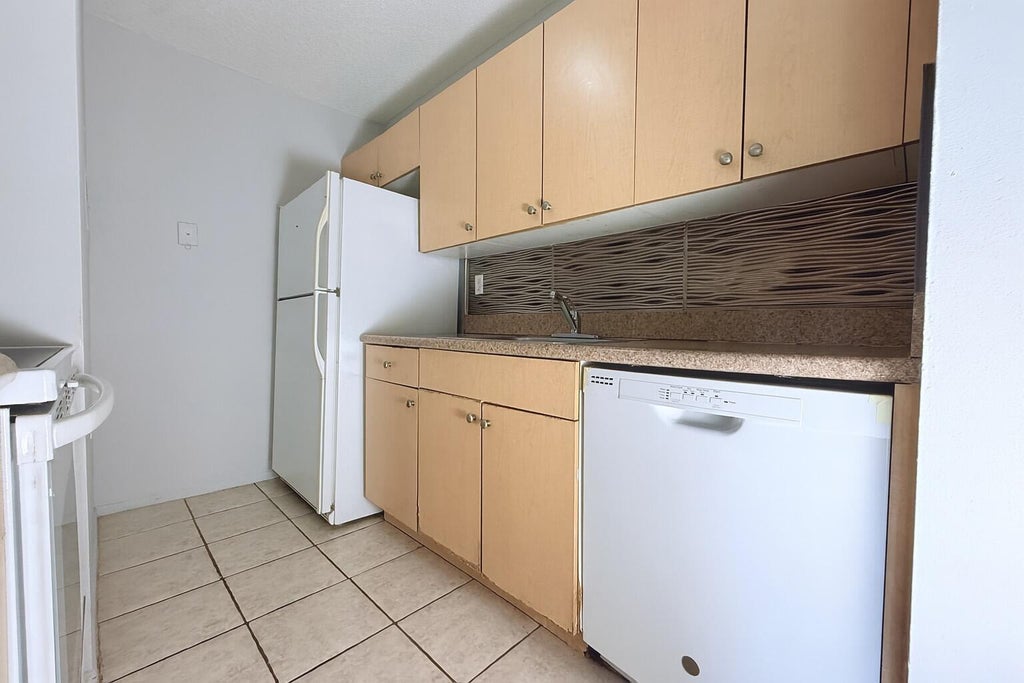 Photo of 1127 Lake Terry Drive #I, West Palm Beach, FL 33411 (MLS # B26075752)