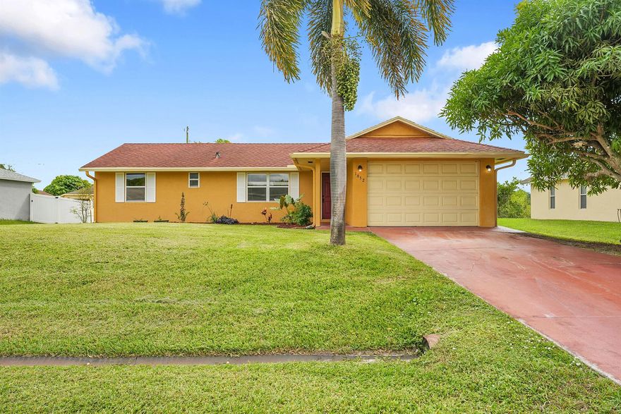 Welcome to your new home a beautifully maintained 3 bedroom, 2 bathroom residence with a spacious garage and an oversized back yard that is a gardener's dream! You will love the abundance of fruit trees offering a private oasis right in your own yard. Located off Rosser south of Gatlin this home sits in one of the most desirable areas in Port St Lucie, Just minutes from Tradition, shopping, dining, parks, and I-95 for easy commuting. Step inside and you will find a bright open floorplan that's completely move-in ready perfect for anyone looking for a low maintenance Florida lifestyle. Homes like this don't come around often and they don't last long. Schedule your private showing today before it's gone!
