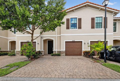 Photo of 4407 Hemlock Drive, Riviera Beach, FL 33410 (MLS # R11120675)