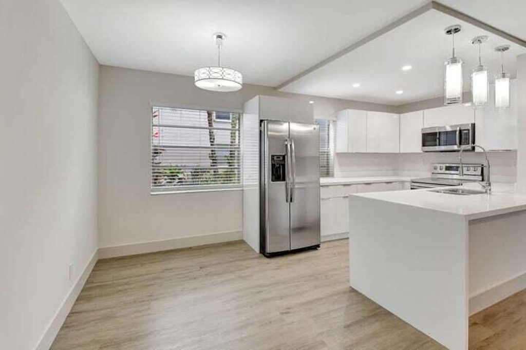 Photo of 725 Burgundy P, Delray Beach, FL 33484 (MLS # R11159739)