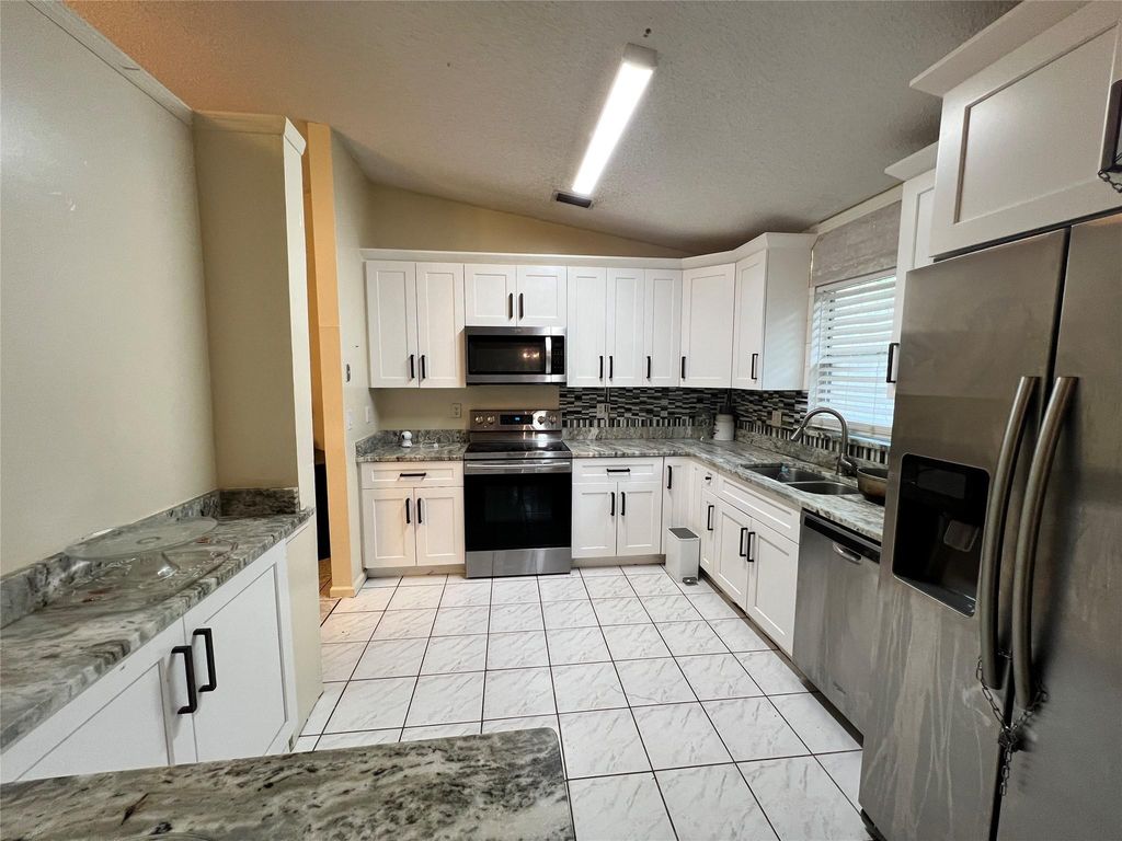 Photo of 1464 Waterway Cove Drive, Wellington, FL 33414 (MLS # F10491331)