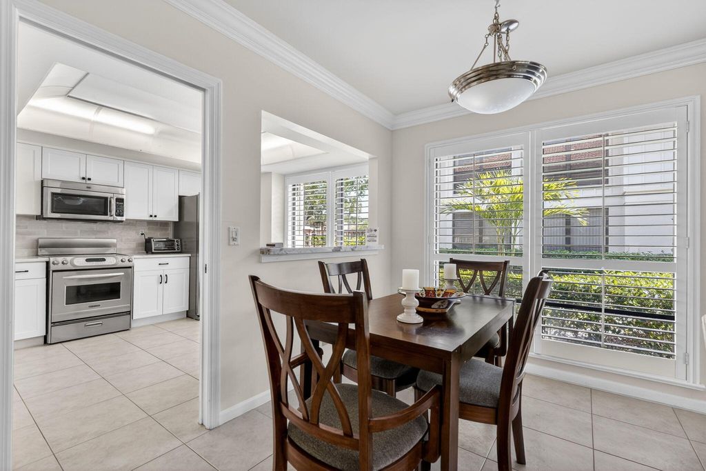 Photo of 479 Brackenwood Lane N, Palm Beach Gardens, FL 33418 (MLS # B26008069)