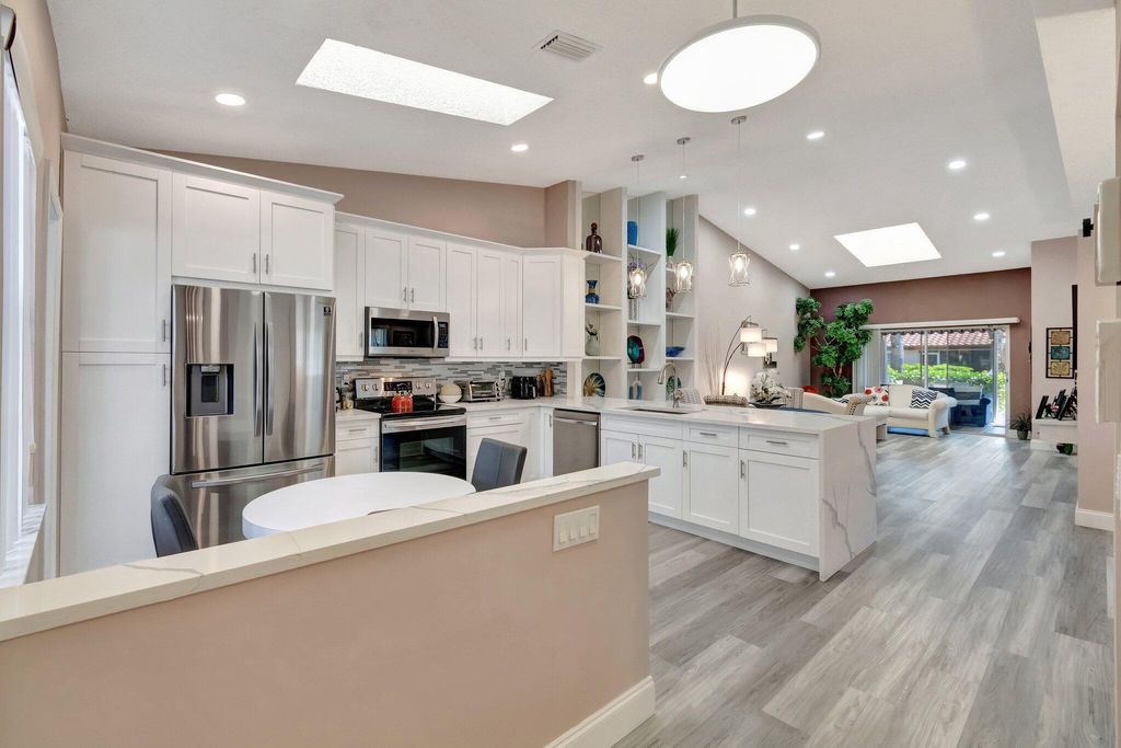 Photo of 6100 Waldwick Circle, Delray Beach, FL 33484 (MLS # R11098505)