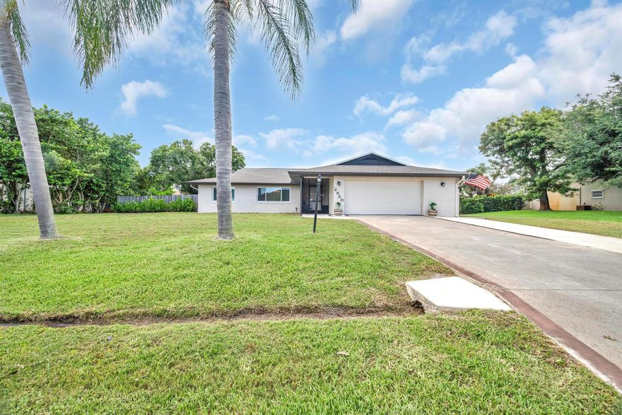 Don't miss your opportunity to own this 3-bedroom, 2-bath home in one of Port Saint Lucie's most desirable neighborhoods! With over 2,000 sq ft of living area, it features a generous layout with a separate dining area, great room, and an updated island kitchen. The large  Primary Suite includes a newly remodeled bath and a XL walk-in closet.  It boasts a LARGE storage /laundry room and an oversized 2+ car garage for your convenience.Enjoy outdoor living in the screened-in pool area with a 40x12 covered patio, cabana bath, and fully fenced .44-acre yard providing privacy perfect for entertaining, kids, or pets.Thoughtfully updated with impact glass windows, a newer roof, HVAC, and water heater, ensuring peace of mind for years to come.Close to beach, shopping, and restaurants