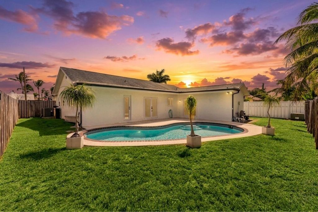 Photo of 11831 NW 38th Place, Sunrise, FL 33323 (MLS # B26021406)