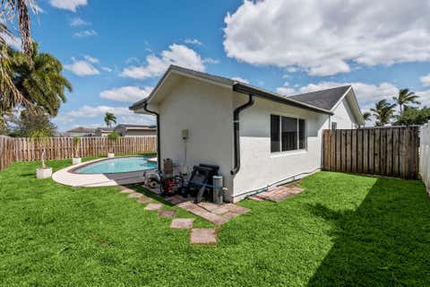 Tiny photo for 11831 NW 38th Place, Sunrise, FL 33323 (MLS # B26021406)