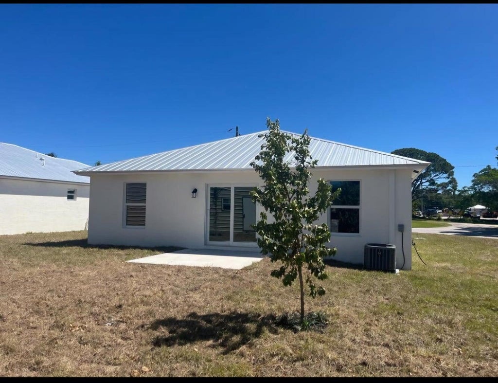 Photo of 1250 NW Antoch Avenue, Stuart, FL 34994 (MLS # R11114755)