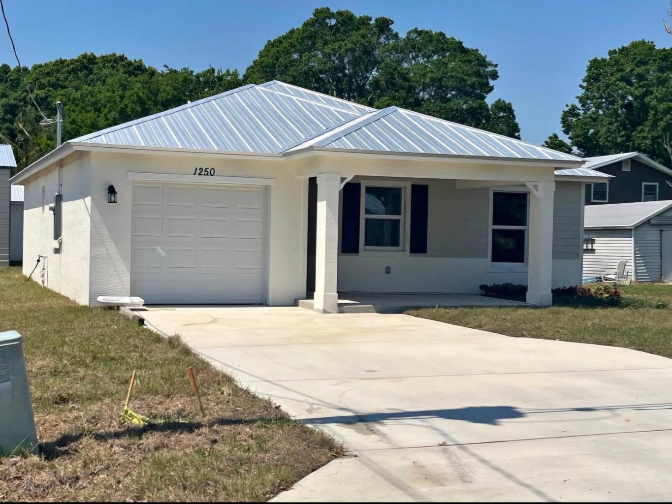 Lawn Care Included!!Be the first to live in this brand new home located in a quiet neighborhood ready for you today! Great location in Stuart, less than 2 miles from the Treasure Coast shopping mall and approximately 3 miles from downtown Stuart. Stuart boasts of a beautiful marina, great shopping, great fishing, a splash waterpark and a Costco. The house has impact windows and a modern kitchen. Tile with wood grain in the main living area and carpet in the bedrooms. One pet is OK. First , and last month's rent and one month security required to move in.
