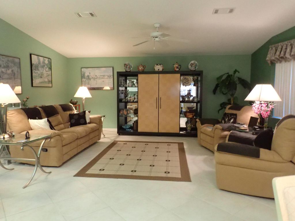 Photo of 8110 9th Hole Drive, Port Saint Lucie, FL 34952 (MLS # R10971490)