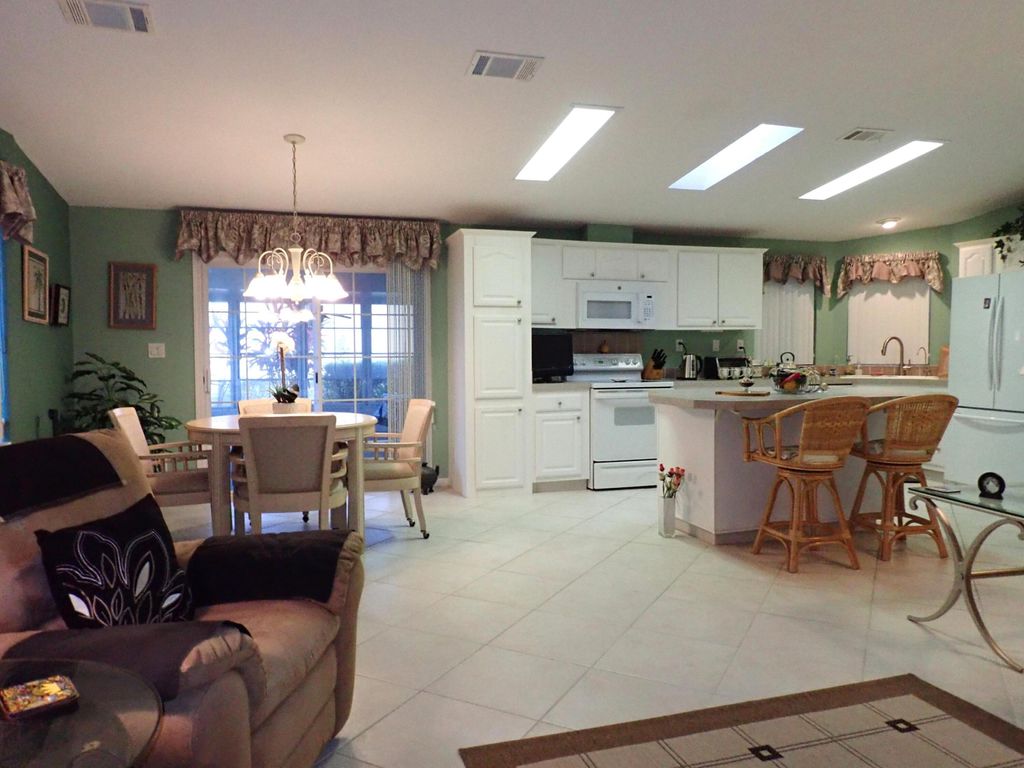 Photo of 8110 9th Hole Drive, Port Saint Lucie, FL 34952 (MLS # R10971490)