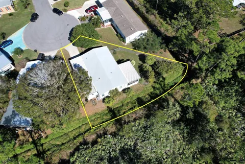 208 Calico Court, Barefoot Bay, FL MLS: R11051784