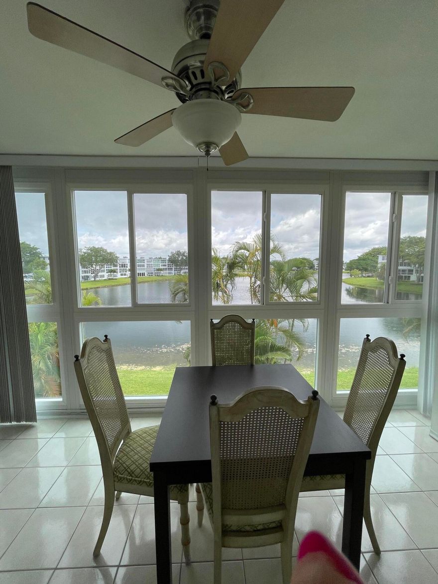 Beautiful move-in ready 1-bedroom, 1.5-bath condo in desirable Century Village East with BEAUTIFUL WATER  views. This well-maintained unit features a newer A/C and water heater (2024), ensuring comfort and efficiency. Enjoy added living space with an A/C unit on the PATIO, perfect for relaxing while overlooking the water. The home offers IMPACT WINDOWS in the patio for added peace of mind, along with an UPDATED kitchen and bathrooms featuring modern finishes. Bright, clean, and thoughtfully upgraded, this condo is truly turnkey—just bring your personal touch and move right in. Updated el.panel.The building is very stable with reserves and new roof.  YOU HAVE IT ALL ! This is  55+ community with resort-style amenities, including clubhouse, pools, fitness center, and more.