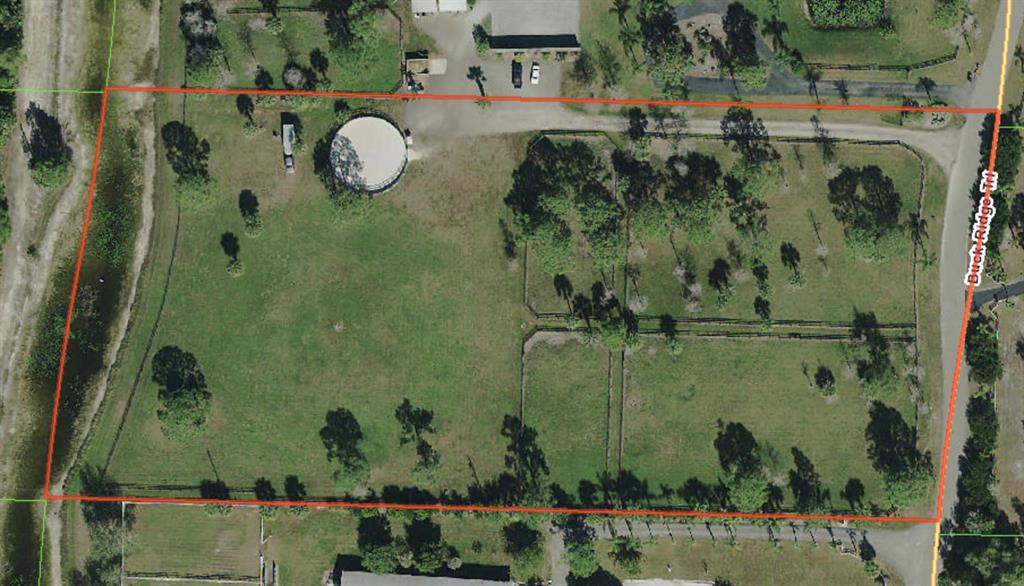 Beautiful Cleared 5 acre Lot. All fenced including some fenced paddocks and a round pen. All irrigation pipes and sprinklers are set on the property. Build your dream Equestrian estate, just minutes from White Fences. Do not miss this great opportunity.