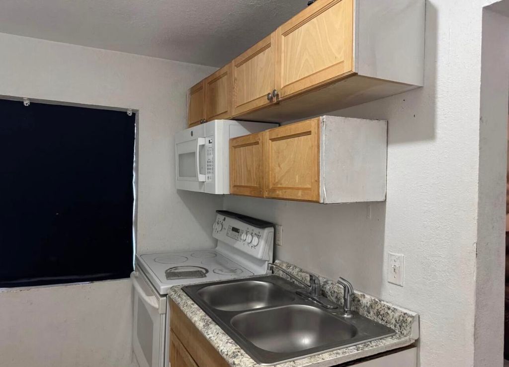 Photo of 1022 17th Street, West Palm Beach, FL 33407 (MLS # B26014039)