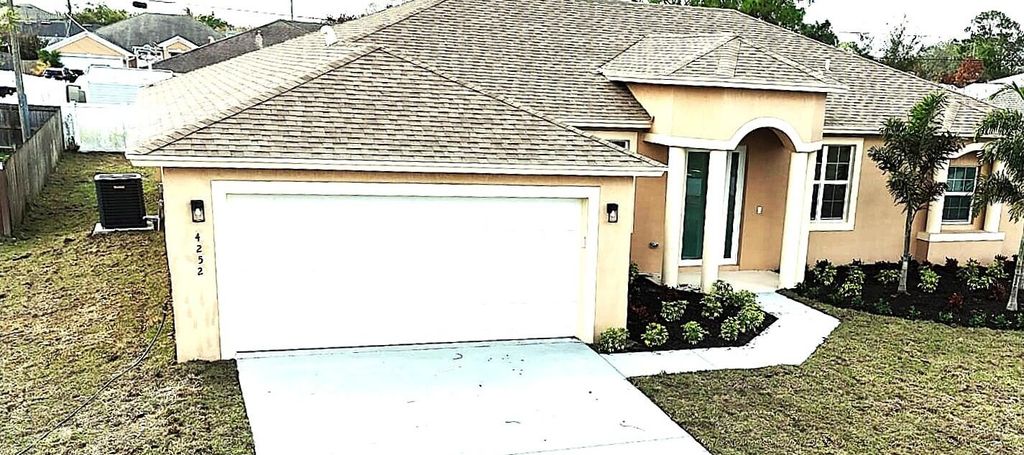 Photo of 4252 SW Muncie Street, Port Saint Lucie, FL 34953 (MLS # R11168872)