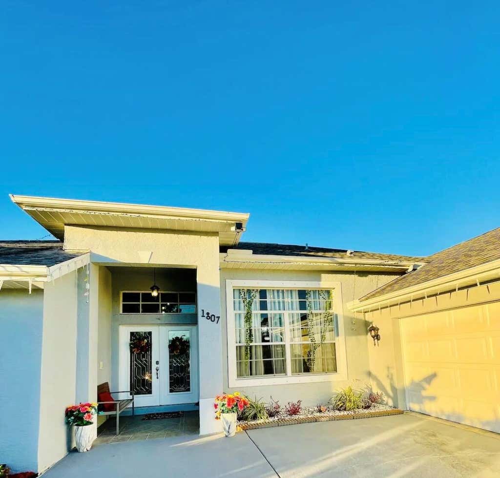 Photo of 1807 SW Dalmation Avenue, Port St Lucie, FL 34953 (MLS # R10913101)