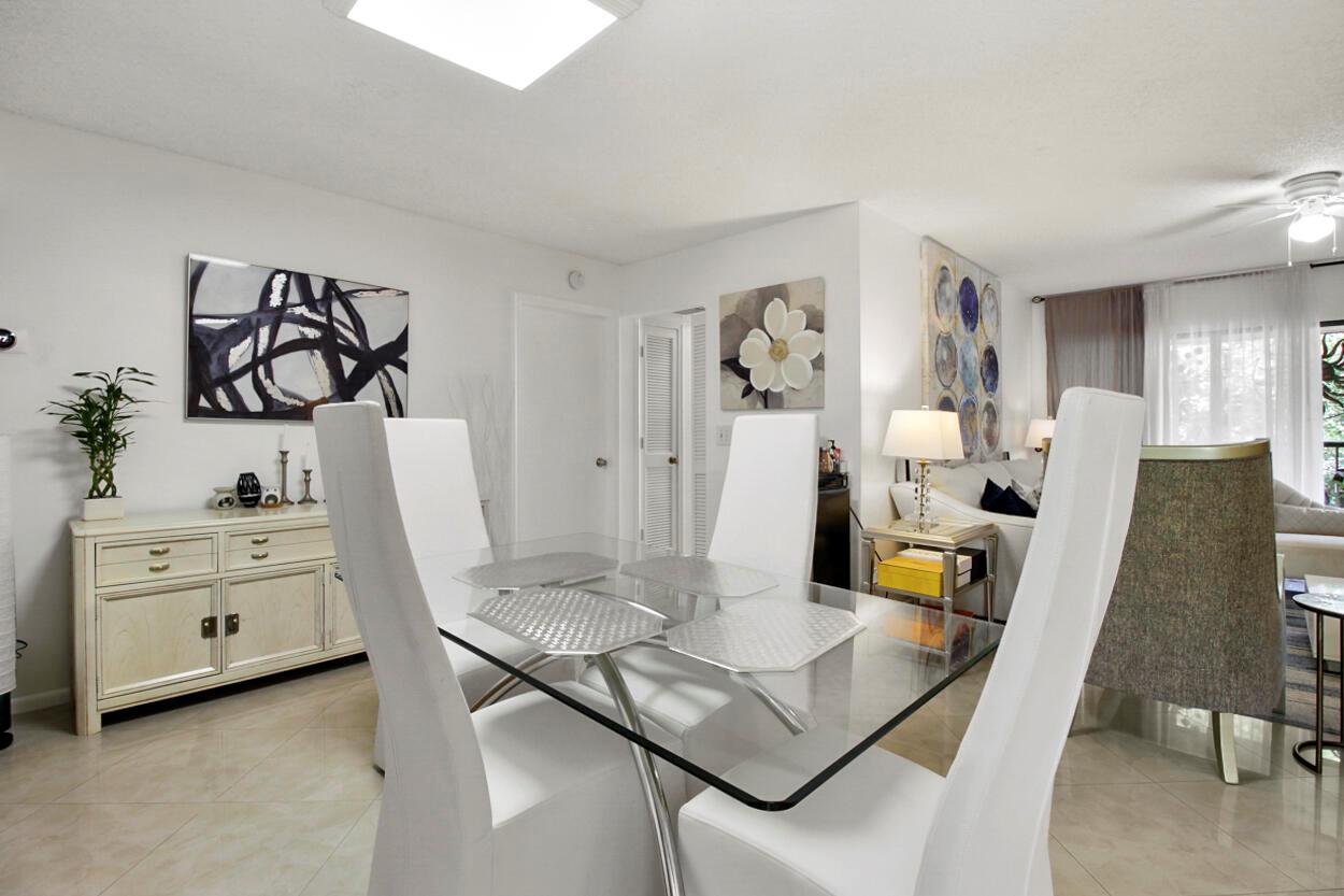 Beautifully remodeled 2nd-floor condo located in a boutique, all-ages, pet-friendly community in the heart of Delray Beach. This spacious 1,250 sq. ft. residence features a freshly painted open floor plan with newer ceramic tile throughout. The large primary suite offers a private, updated ensuite bathroom with dual sinks, while the generous guest bedroom is complemented by a fully remodeled guest bath. Enjoy a versatile office or breakfast nook off the kitchen, overlooking a serene private garden. Additional highlights include a newer A/C (2023) and in-unit washer and dryer. Just minutes from vibrant Atlantic Avenue, top-rated dining, shopping, golf courses, and Delray's stunning beaches.