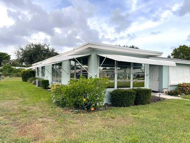 Photo of 237 HIGH POINT Court W #A, Delray Beach, FL 33445 (MLS # B26055927)
