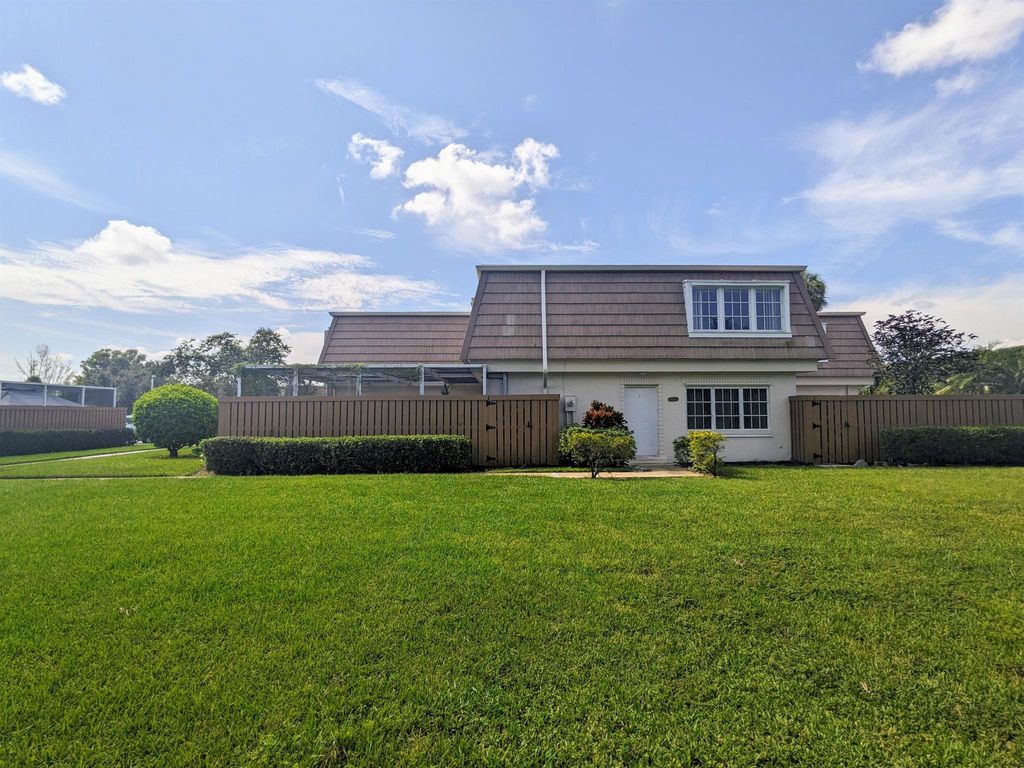 Photo of 11615 Winchester Drive #D, Palm Beach Gardens, FL 33410 (MLS # R10917401)