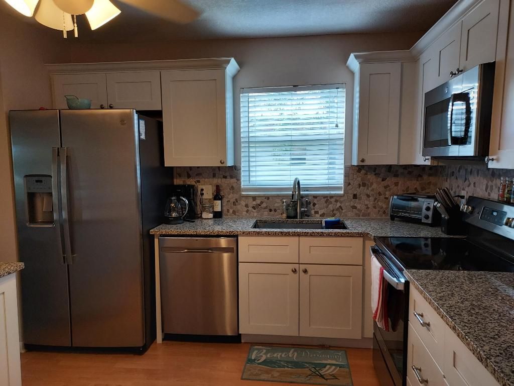 Photo of 717 S Us Highway 1 #408, Jupiter, FL 33477 (MLS # R10943747)