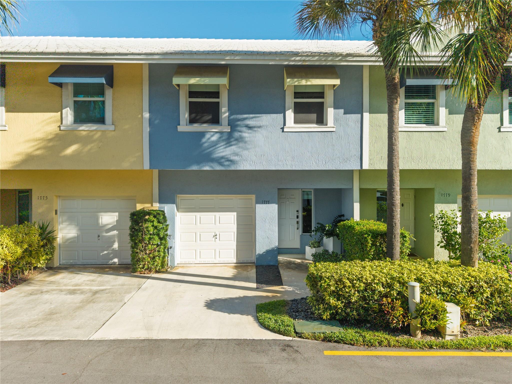 Waterfront Townhome! Renovated 2-bed, 2.5-bath, perfectly positioned with private views of Richardson Historic Park. Nestled in the gated community of River Landings, you're just steps away from the lively Wilton Drive! Inside find an open concept layout, featuring a contemporary kitchen with new appliances. The living and dining areas flow seamlessly to a private patio, offering panoramic views of the Middle River. Upstairs discover two generously sized bedrooms and two updated baths. Packed with modern upgrades, including new impact windows/doors, a new HVAC system, updated electrical, and new Icynene insulation. A convenient 1-car attached garage and driveway parking. Enjoy a community swimming pool. All furniture is available as a package, making it the ultimate move-in ready home!