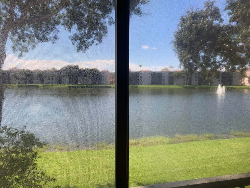 Photo of 6065 Pointe Regal Circle #202, Delray Beach, FL 33484 (MLS # R10747679)