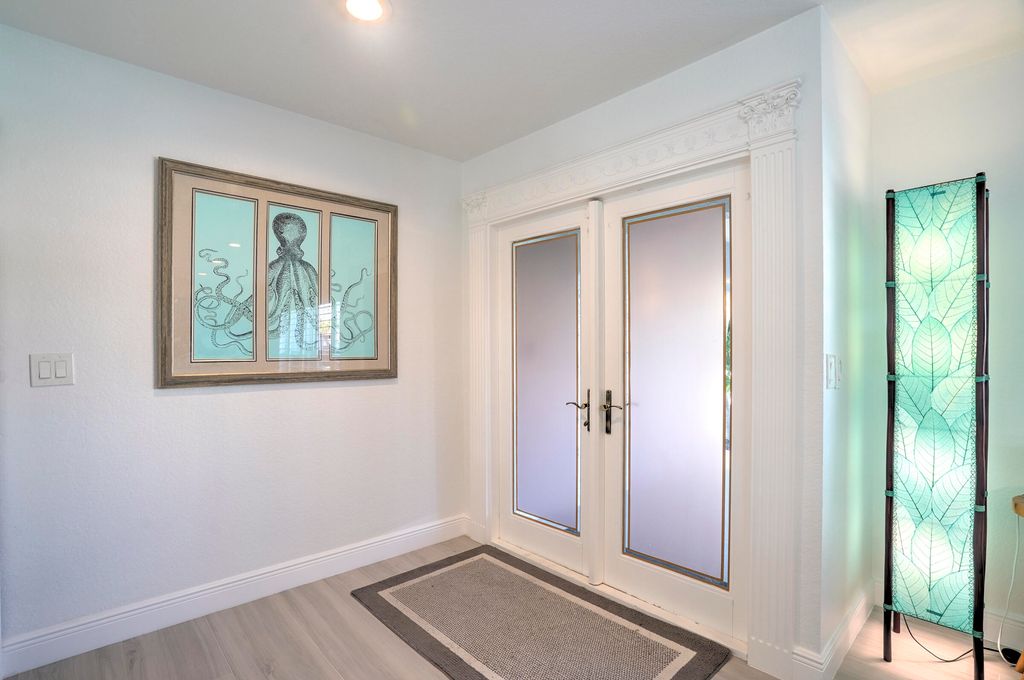 Photo of 1201 Singer Drive, Riviera Beach, FL 33404 (MLS # R11164905)