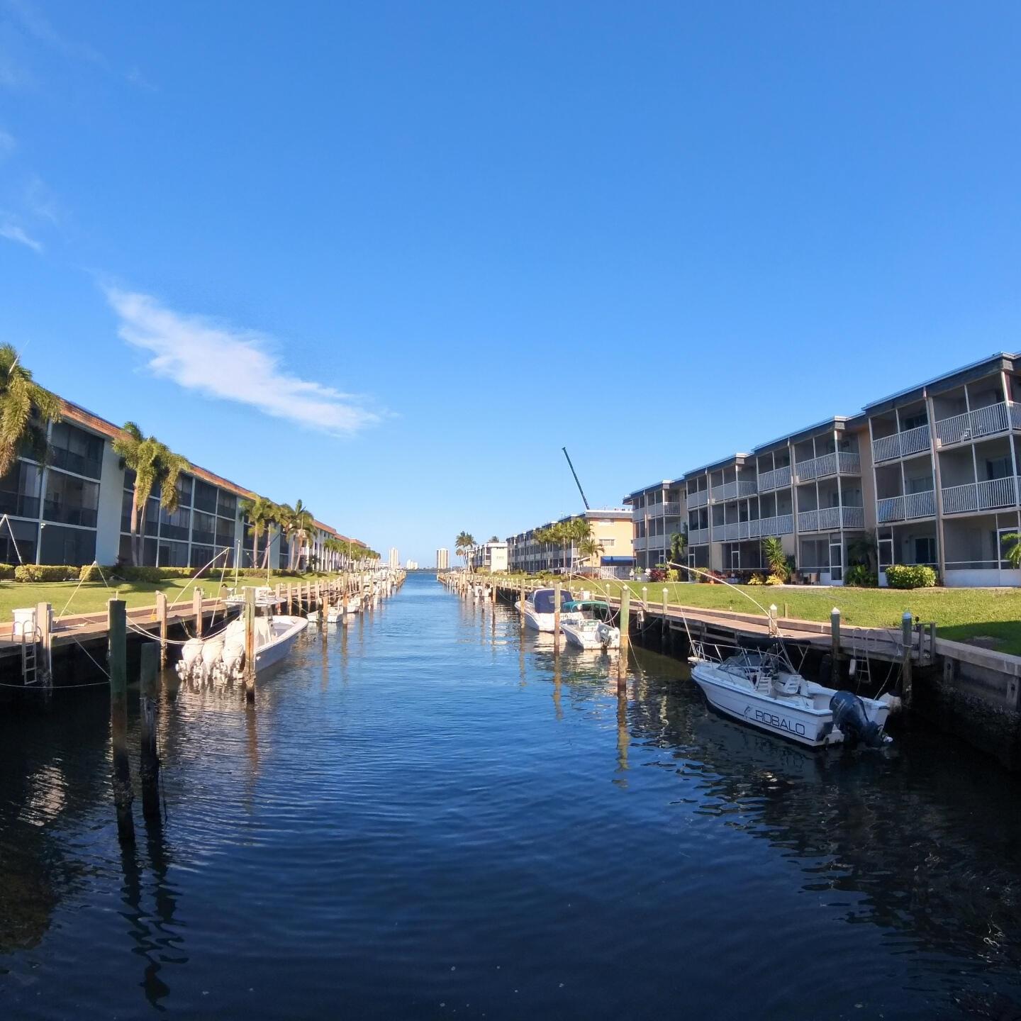 This updated condominium offers tile floors, white cabinetry, granite countertops, walk-in closets, assigned parking, and extra storage. Enjoy stunning Intracoastal and pool views from the screened-in balcony. Priced to sell quickly, this home won't last long! It's pet-friendly (1 pet up to 25lbs) and rentals are allowed after the first year.With NO assessments or upcoming assessments, Concrete restoration was completed in 2020, this is a hassle-free opportunity. Located near top restaurants and shops, don't miss this great opportunity!